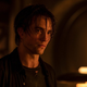 Robert Pattinson looks sad with wet hair in an image from The Batman.